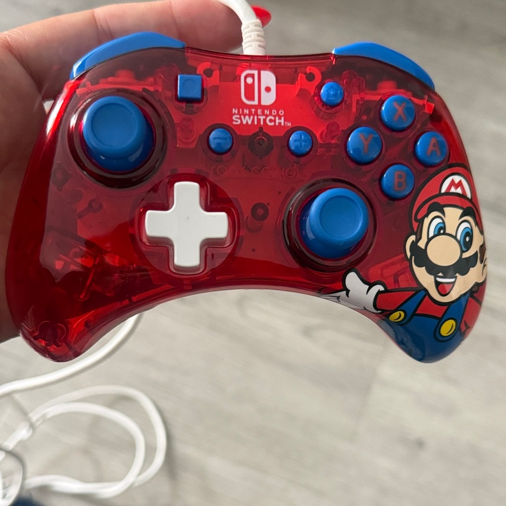 Nintendo Switch Red and Blue Controller with Mario Graphic